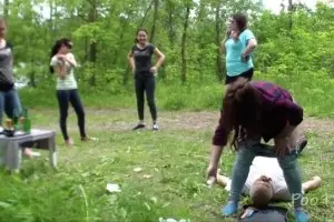 Girls shitting into the mouth of a guy in the open air 2