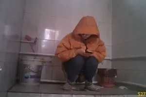 Hidden cam in the women's restroom somewhere in Asia 3