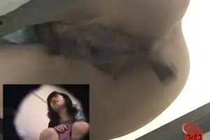 Hidden camera shot pooping Japanese girl in the women restroom