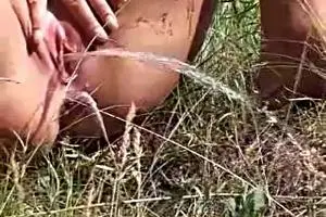 Young girl pissing holethumb img