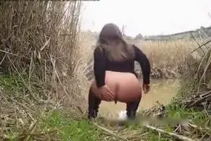Girl diarrhea in pond