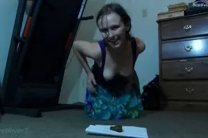 Young crazy girl poops on the floor