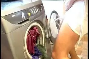 Girl piss in the washing machine